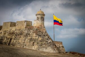 castillo de san felipe and colombian flag cartagena colombia